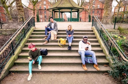 group-of-multiracial-friends-using-mobile-smart-ph-2024-07-03-02-44-13-utc